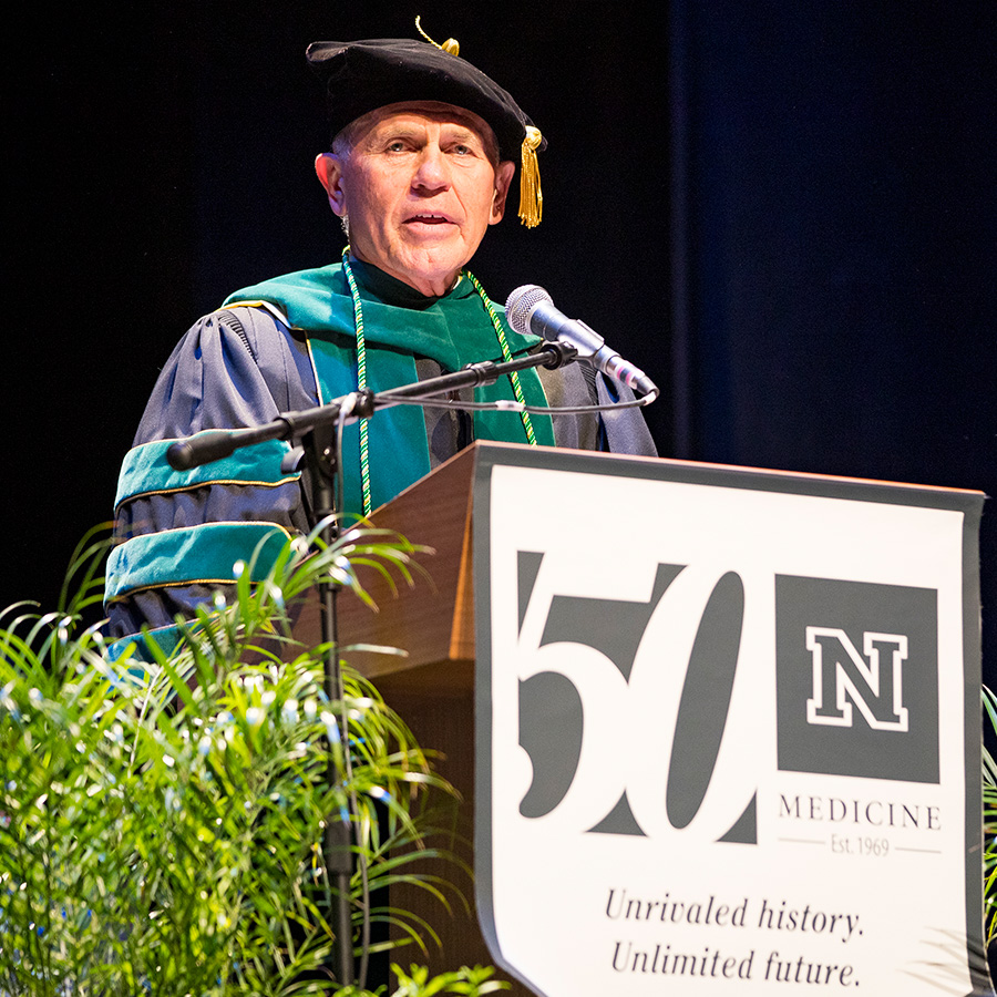 Dr. Schwenk speaking at graduation