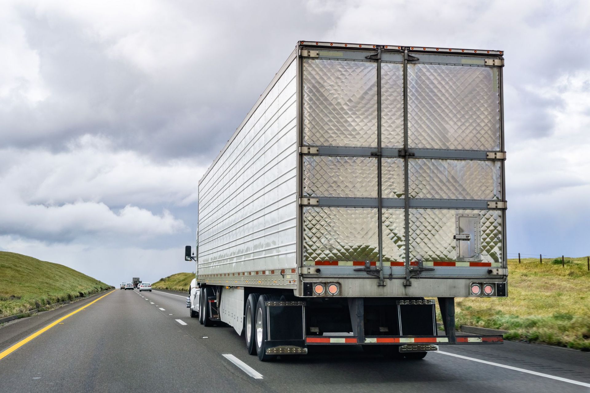 back of a silver semi truck